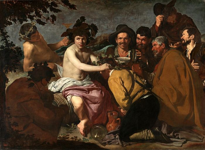 Un corro de hombres bebiendo en el suelo alrededor de una figura sentada, al aire libre — Diego Velázquez. Dominio público.